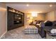 Finished basement with custom media center and comfortable seating area at 5654 Broadway St, Indianapolis, IN 46220