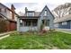 Lovely two-story home featuring a covered porch, bay window and a well-maintained yard at 5654 Broadway St, Indianapolis, IN 46220