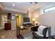 Bright basement home office featuring built in desk and storage at 5654 Broadway St, Indianapolis, IN 46220