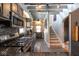 Updated kitchen with stainless steel appliances, a breakfast nook and access to stairs at 5654 Broadway St, Indianapolis, IN 46220