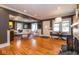 Inviting living room boasting a fireplace, hardwood floors and ample natural light at 5654 Broadway St, Indianapolis, IN 46220