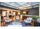 Cozy living room showcasing hardwood floors, recessed lighting, fireplace and contemporary furniture at 5654 Broadway St, Indianapolis, IN 46220