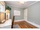 Home office with laminate floors, neutral paint and a whiteboard at 5654 Broadway St, Indianapolis, IN 46220