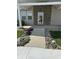 Close up on the entrance with a well-lit walkway leading to the front door at 600 Fairlane Dr, Edinburgh, IN 46124