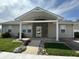 Charming single-story home with welcoming covered porch and landscaped front yard at 600 Fairlane Dr, Edinburgh, IN 46124