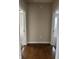 Hardwood hallway with views of carpeted bedrooms at 600 Fairlane Dr, Edinburgh, IN 46124