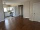 Inviting living room with hardwood flooring and easy access to kitchen and other rooms at 600 Fairlane Dr, Edinburgh, IN 46124