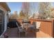 Outdoor deck with dining table, chairs, grill, and scenic view at 6174 Bristlecone Dr, Fishers, IN 46038