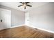 Bedroom features hardwood floors and two entry doors at 622 E 37Th St, Indianapolis, IN 46205