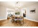 Inviting dining area showcasing hardwood floors and an open floor plan at 622 E 37Th St, Indianapolis, IN 46205