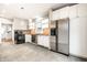 Bright kitchen boasts modern appliances, ample counter space, and tile flooring at 622 E 37Th St, Indianapolis, IN 46205