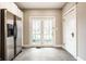 Bright kitchen with French doors leading to the backyard at 622 E 37Th St, Indianapolis, IN 46205