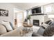 Inviting living room featuring a fireplace, hardwood floors, and comfortable seating at 622 E 37Th St, Indianapolis, IN 46205