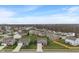 Charming home with a spacious front yard in a peaceful neighborhood, surrounded by lush greenery at 6316 Avacado Dr, Indianapolis, IN 46217