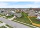 Charming two-story home with a spacious front yard and long driveway in a lovely neighborhood at 6316 Avacado Dr, Indianapolis, IN 46217