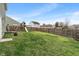 Spacious backyard with a playset, perfect for outdoor activities and enjoyment at 6316 Avacado Dr, Indianapolis, IN 46217