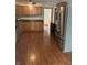 Well-lit kitchen featuring stainless steel appliances and wood cabinets, offering a functional and modern cooking space at 6389 N Forest St, Martinsville, IN 46151