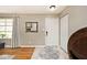 Inviting entryway with stylish tile flooring, natural lighting, and coat closet at 6436 Lakeland Blvd, Indianapolis, IN 46234