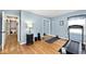 Well-lit home workout room with hardwood floors and exercise equipment at 6436 Lakeland Blvd, Indianapolis, IN 46234