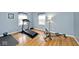 Bright home workout room with hardwood floors and exercise equipment at 6436 Lakeland Blvd, Indianapolis, IN 46234