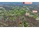 This aerial view shows the location of the property in relation to Mooresville, IN, and St Rd 144 at 6761 E Woodland Ct, Mooresville, IN 46158