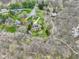 Beautiful home with solar panels amid a mature tree canopy at 6761 E Woodland Ct, Mooresville, IN 46158