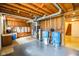 Basement utility area with wooden cabinetry and mechanicals at 6761 E Woodland Ct, Mooresville, IN 46158