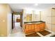 Bright bathroom with double sinks, granite counters, and glass shower at 6761 E Woodland Ct, Mooresville, IN 46158