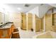 Spacious bathroom with double sinks, granite countertop, shower, and soaking tub at 6761 E Woodland Ct, Mooresville, IN 46158