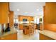 Well-equipped kitchen featuring custom cabinets, granite countertops, and a center island with seating at 6761 E Woodland Ct, Mooresville, IN 46158