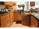 Custom kitchen with a convenient mixer stand and countertop, complete with stainless steel appliances at 6761 E Woodland Ct, Mooresville, IN 46158