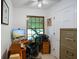 Functional home office featuring a wooden desk, ample storage, and natural light at 6761 E Woodland Ct, Mooresville, IN 46158