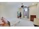 Relaxing bedroom featuring neutral tones, a ceiling fan, and ample natural light at 6802 Carters Grove Dr, Noblesville, IN 46062