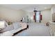 Bright bedroom featuring a spacious layout, ceiling fan, and neutral decor at 6802 Carters Grove Dr, Noblesville, IN 46062
