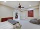 Large basement bedroom showcasing a walk in closet, with plush carpeting and comfortable furnishings at 6802 Carters Grove Dr, Noblesville, IN 46062