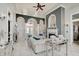 Open-concept living room featuring fireplace, elegant furnishings, and seamless flow throughout at 6802 Carters Grove Dr, Noblesville, IN 46062