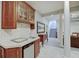 A well-appointed wet bar area with custom cabinetry in the finished basement at 6802 Carters Grove Dr, Noblesville, IN 46062
