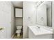 Bathroom featuring a toilet, sink, mirror, and cabinet at 693 Cembra Dr, Greenwood, IN 46143