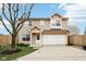 Charming two-story home with a well-maintained lawn and attached two-car garage at 693 Cembra Dr, Greenwood, IN 46143
