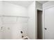 Practical laundry room with a storage shelf and a utility hookup at 693 Cembra Dr, Greenwood, IN 46143
