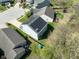Aerial view of a home with solar panels on the roof in a residential area at 7010 Beargrass Ct, Indianapolis, IN 46241