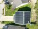 Birds-eye view of solar panels on a roof with trees and cars visible at 7010 Beargrass Ct, Indianapolis, IN 46241