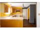 Awaiting remodel, this kitchen offers a blank canvas for homeowners at 7010 Beargrass Ct, Indianapolis, IN 46241
