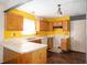 Awaiting remodel, this kitchen offers a blank canvas for homeowners at 7010 Beargrass Ct, Indianapolis, IN 46241