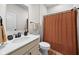 Bathroom featuring a modern vanity, neutral tones, and a shower with a curtain at 7210 Covington St, Lebanon, IN 46052