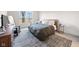 Bedroom featuring a large window and cozy area rug at 7210 Covington St, Lebanon, IN 46052