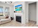 Cozy living area featuring a fireplace and views of the serene outdoors at 7210 Covington St, Lebanon, IN 46052