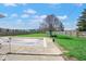 Expansive backyard with a fenced perimeter, a covered pool, green grass, and plenty of room to roam at 7265 Derbyshire Dr, Cumberland, IN 46229