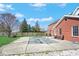 A spacious backyard features a pool and a grassy area, ideal for relaxation and recreation at 7265 Derbyshire Dr, Cumberland, IN 46229