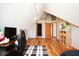 Attic bedroom featuring angled ceilings, a bed, desk, and plush toys at 7265 Derbyshire Dr, Cumberland, IN 46229
